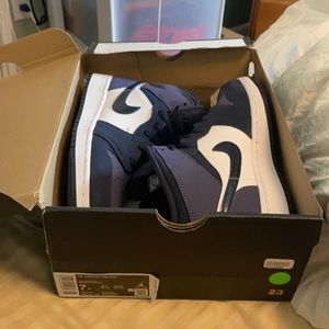air jordan 1 mid; lightly used; good condition; goat verified
